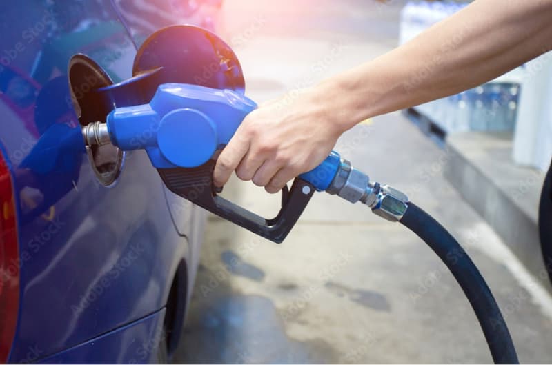 gas pump filling up car